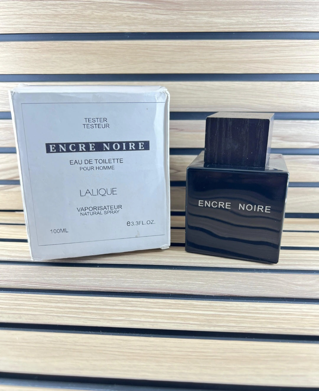 Encr.e noir.e laliq.ue perfume